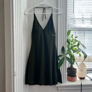 Green open back halter dress